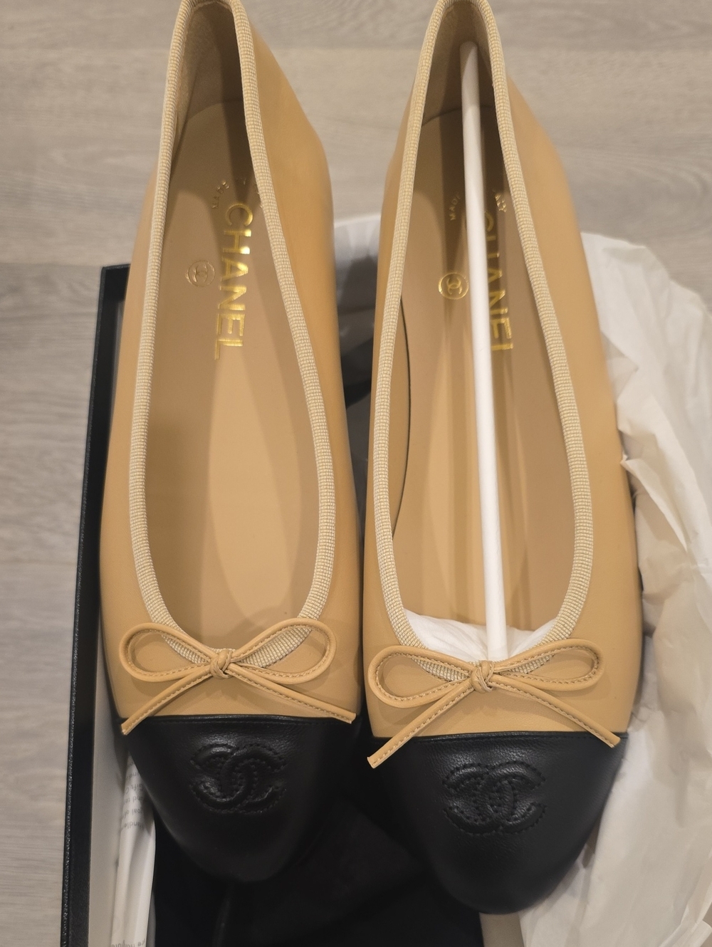 CHANEL Beige and Black Two-Tone Leather Cap-Toe Ballet Flats